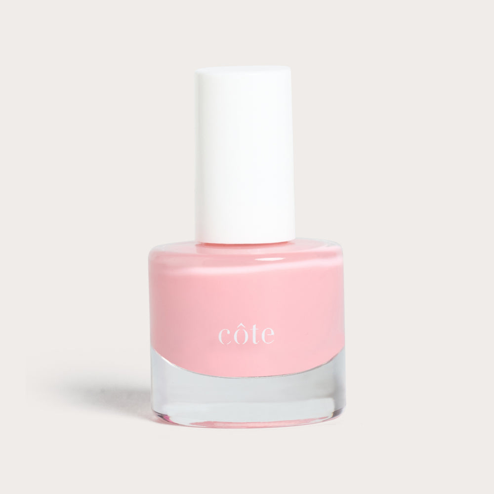 Côte Beauty Pink Clouds Sheer Petal Blush Non-Toxic Nail Polish bottle. 