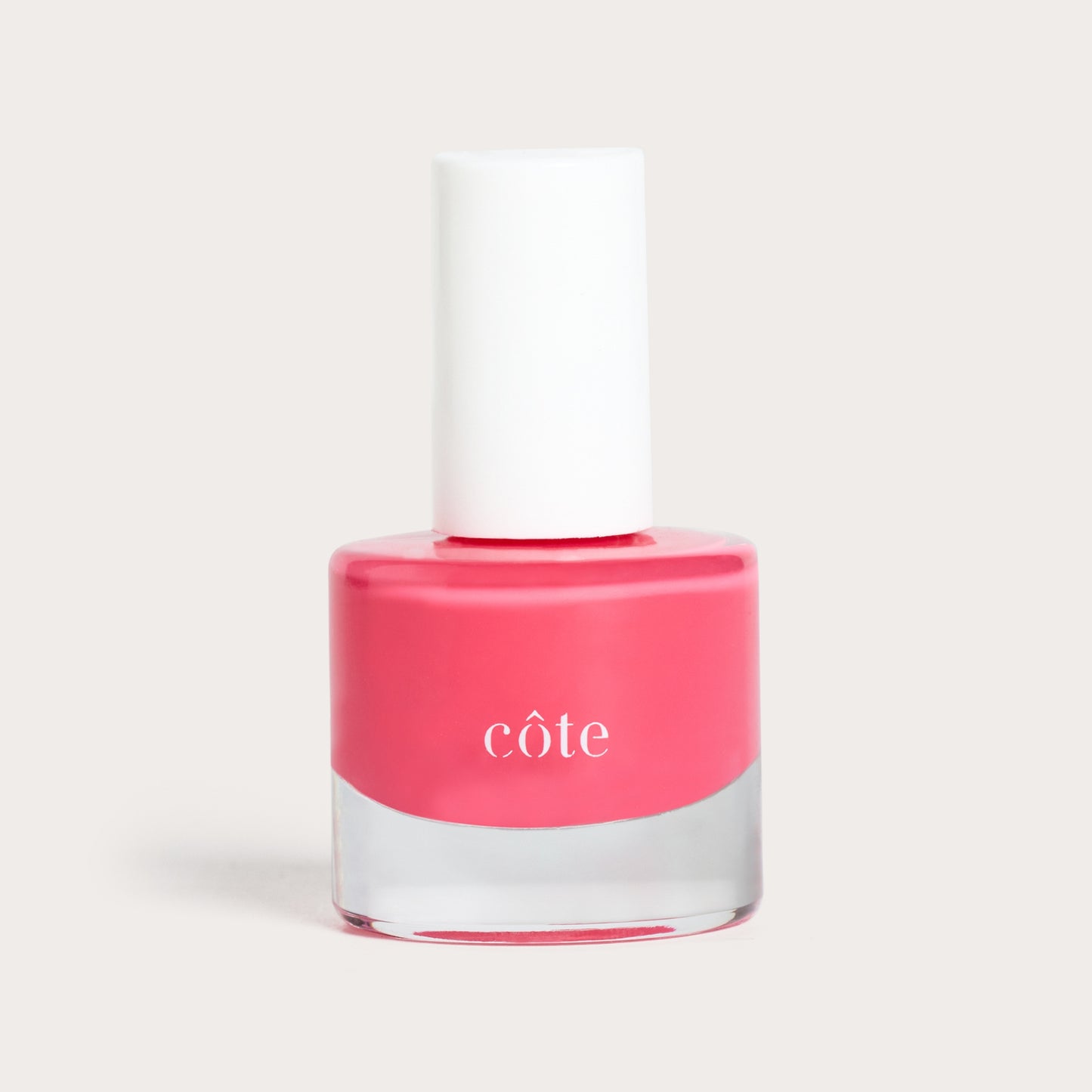 Côte Beauty Wild Peony Vivid Petal Pink Non-Toxic Nail Polish bottle. 